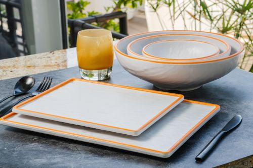 Bols et plats en mélamine empilables blanc et orange