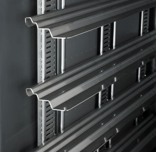 Réglage des glissières inox du conteneur isotherme